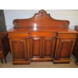 Victorian mahogany break front sideboard with arched top and panelled doors to base, 170cm wide