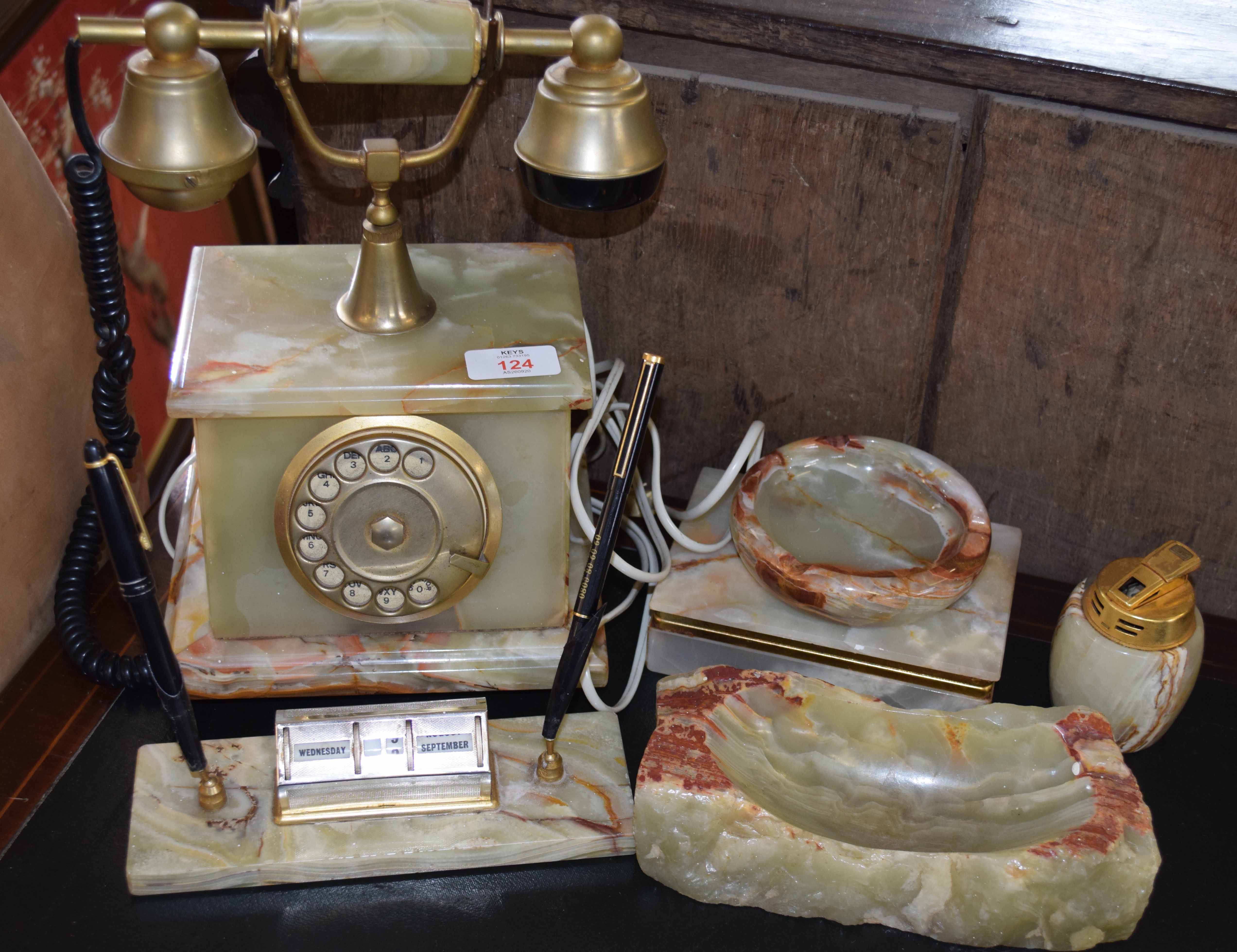 Late 20th century green onyx desk set comprising candlestick, telephone, ashtray, cigarette box,