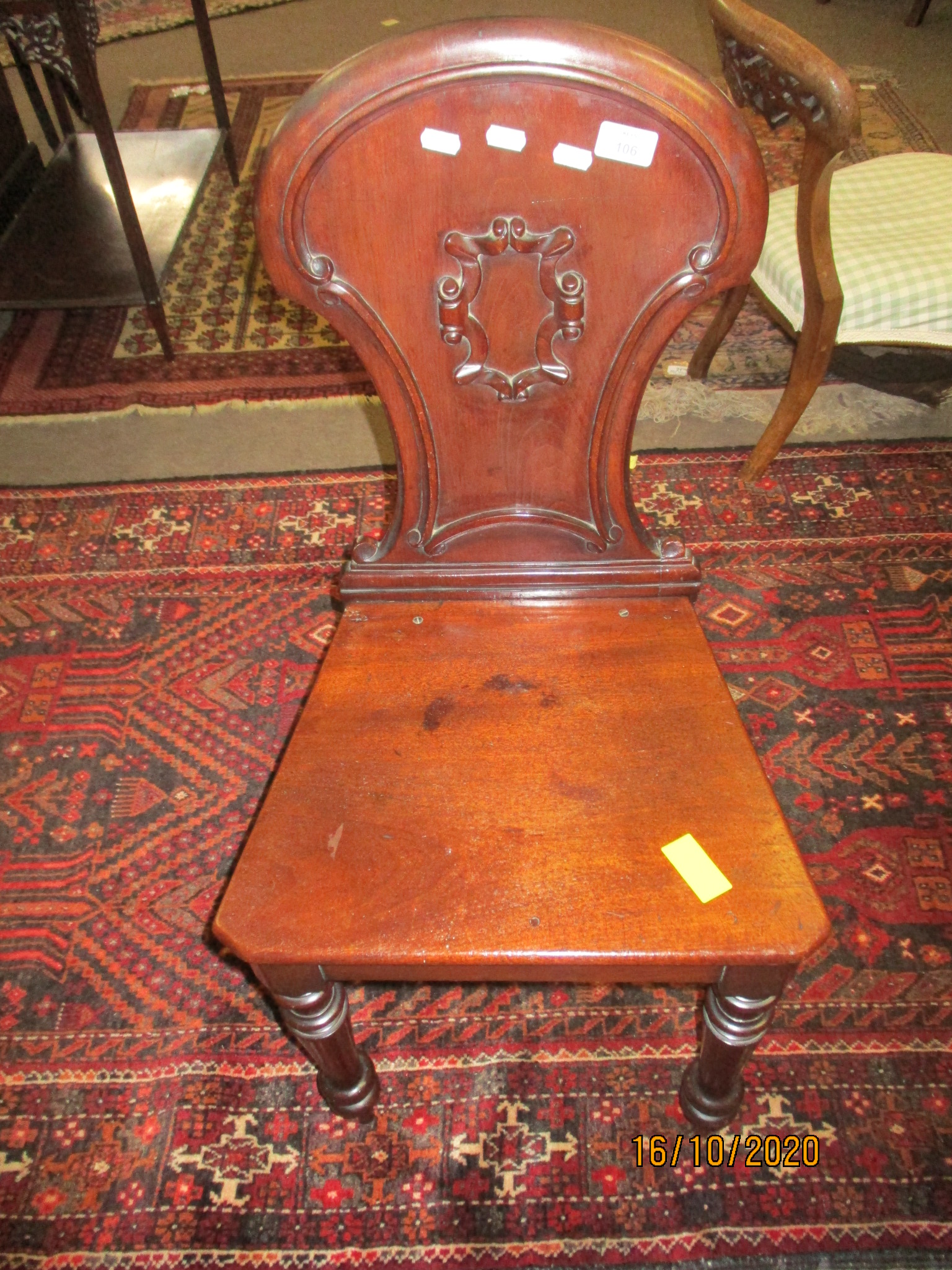 Victorian mahogany hall chair, arch back, solid seat and ring turned front supports