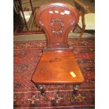 Victorian mahogany hall chair, arch back, solid seat and ring turned front supports