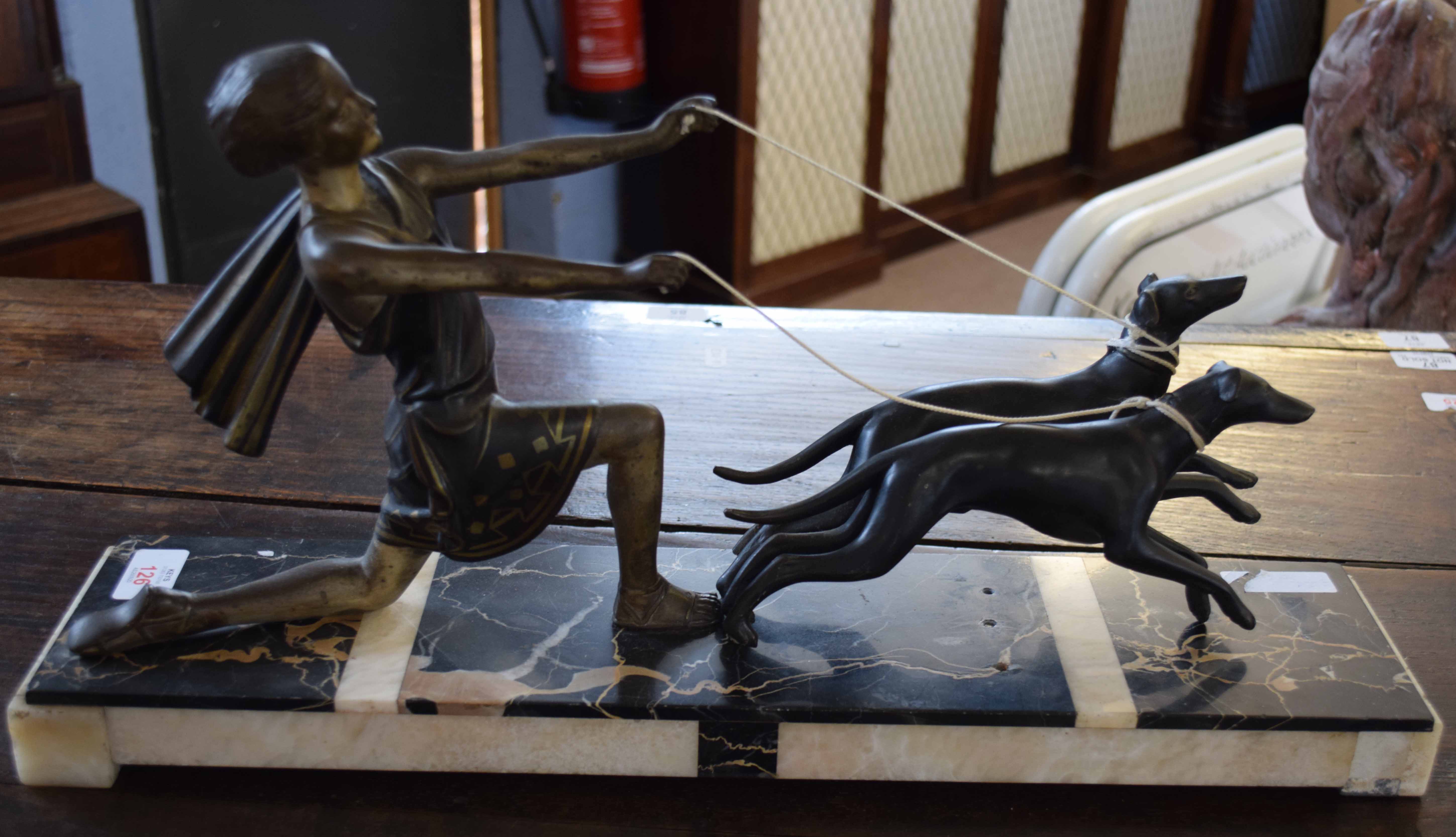 Art deco period spelter group standing on a pedestal (losses and repaired throughout) 52cm wide
