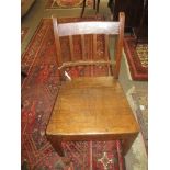 Oak solid seat side chair circa early 19th century