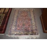 Small Caucasian rug, multi-gull border, central tree of life design with birds etc, mainly puce