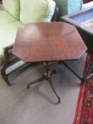 Rosewood simulated octagonal pedestal table with ring turned support and tripod base, circa early