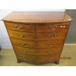 Early 19th century mahogany bow front chest inlaid throughout with boxwood stringing, two short