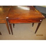 Early 19th century mahogany fold-top tea table with plain frieze and tapering square supports,