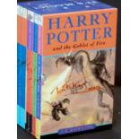 J K ROWLING: THE HARRY POTTER BOXED SET COMPRISING HARRY POTTER AND THE PHILOSOPHER'S STONE -