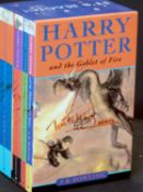 J K ROWLING: THE HARRY POTTER BOXED SET COMPRISING HARRY POTTER AND THE PHILOSOPHER'S STONE -