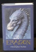 CHRISTOPHER PAOLINI: ERAGON, London, Doubleday, 2004, 1st edition, signed, original bookmark loosely