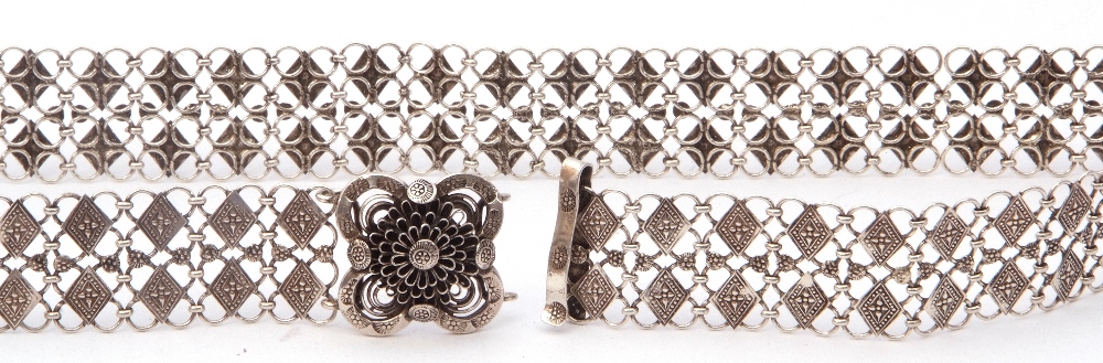 Chinese style white metal belt comprising small circular links decorated with chased geometric - Image 3 of 4