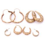 Mixed Lot: three pairs of yellow metal hoop earrings (a/f), 9.3gms, together with a small pair of