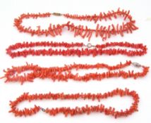 Mixed Lot: four vintage stag coral necklaces