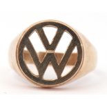 9ct gold ring, the pierced panel with the VW emblem, plain polished overall, size T, 5.1gms