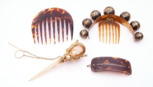 Mixed Lot: unusual antique metal hair comb, the gilt and black frame engraved with floral sprays and