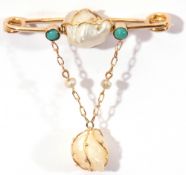 Baroque and turquoise pin brooch, a design with a central wire work set baroque pearl flanked by two