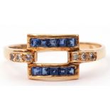 Modern sapphire and diamond ring, a rectangular open work design set with calibre cut sapphires