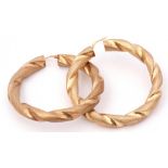 Pair of large circular 9ct gold rope twist earrings of burnished design, 6cm diam, 12.1gms