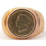 9ct stamped one dollar coin ring dated 1853, the coin in rub-over setting between hatched engraved