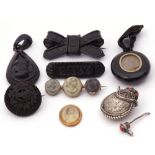 Mixed Lot: Victorian carved jet pendant, an oval shaped mourning pendant with plaited hair panel