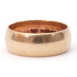 9ct gold wide band wedding ring of plain polished design, London 1972, size P, 5.7gms