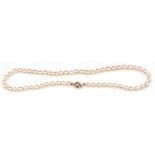 Cultured pearl necklace, a single row of uniform beads, 6mm diam, to a 375 stamped ball clasp,