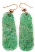 Pair of Oriental jade earrings of elongated pierced and carved design, 3.5cm long, both a/f