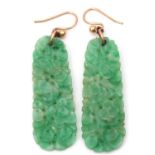 Pair of Oriental jade earrings of elongated pierced and carved design, 3.5cm long, both a/f