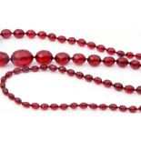Vintage cherry amber faceted bead necklace, a single row of graduated oval beads, .5cm to 2.5cm