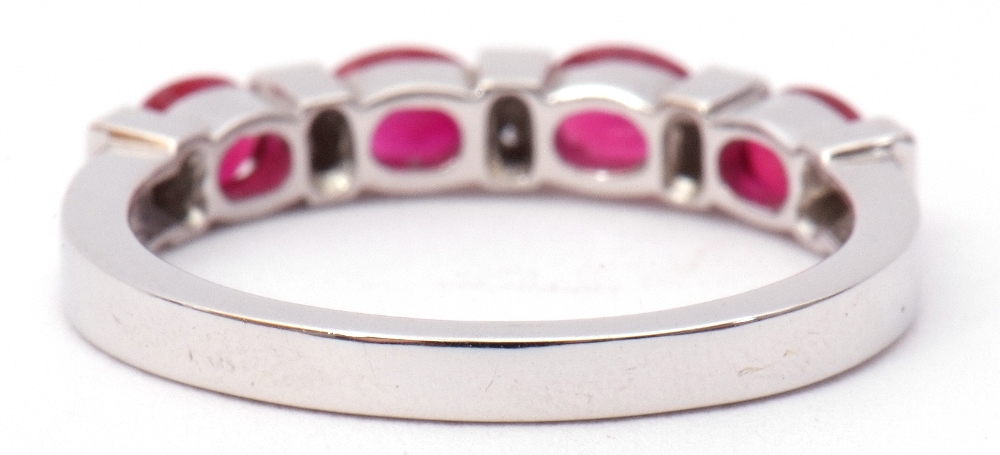 Modern ruby and diamond half-hoop ring, a design featuring 4 oval faceted rubies between 5 pairs - Image 6 of 8