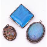 Mixed Lot: sterling mounted butterfly wing brooch of square form, together with two oval shaped