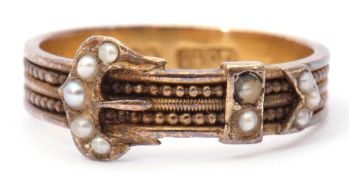 Antique 15ct stamped and seed pearl buckle ring, the band with a continuous beaded pattern with a