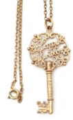 9ct gold "key" pendant, the pierced bow with "Happy Birthday", 4.5cm long, suspended from an oval