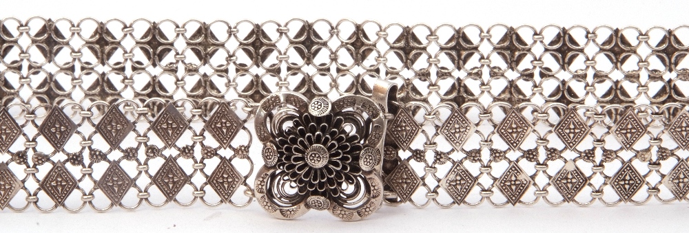 Chinese style white metal belt comprising small circular links decorated with chased geometric - Image 2 of 4