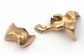 Two small pieces of dental gold, g/w 6.2gms