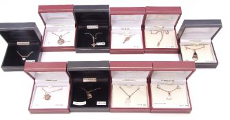 Ten boxed white sterling modern pendants