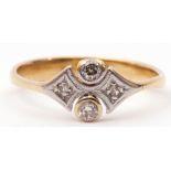 Art Deco four-stone diamond ring, a design featuring two bezel set old cut diamonds and two small