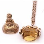 Mixed Lot: antique swivel faceted citrine fob in a yellow metal scroll mount suspended from a yellow