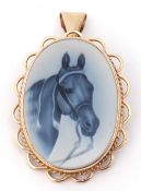 Italian intaglio horse-head brooch/pendant framed in a 9ct gold mount and bale, 3.5 x 2.5cm