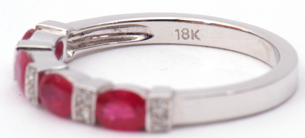 Modern ruby and diamond half-hoop ring, a design featuring 4 oval faceted rubies between 5 pairs - Image 7 of 8