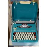 SMITH CORONA CALYPSO TYPEWRITER IN BLUE TRAVELLING CASE