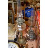 OIL LAMP WITH GLASS RESERVOIR ON BRASS STEM, FURTHER OIL LAMP AND GLASS SHADES