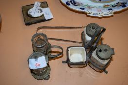 TWO METAL CRUETS AND A CHINA OVAL PLAQUE COMMEMORATING THE CORONATION OF QUEEN ELIZABETH