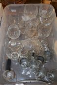 PLASTIC BOX CONTAINING GLASS WARES, BRANDY GLASSES, WINE GLASSES ETC