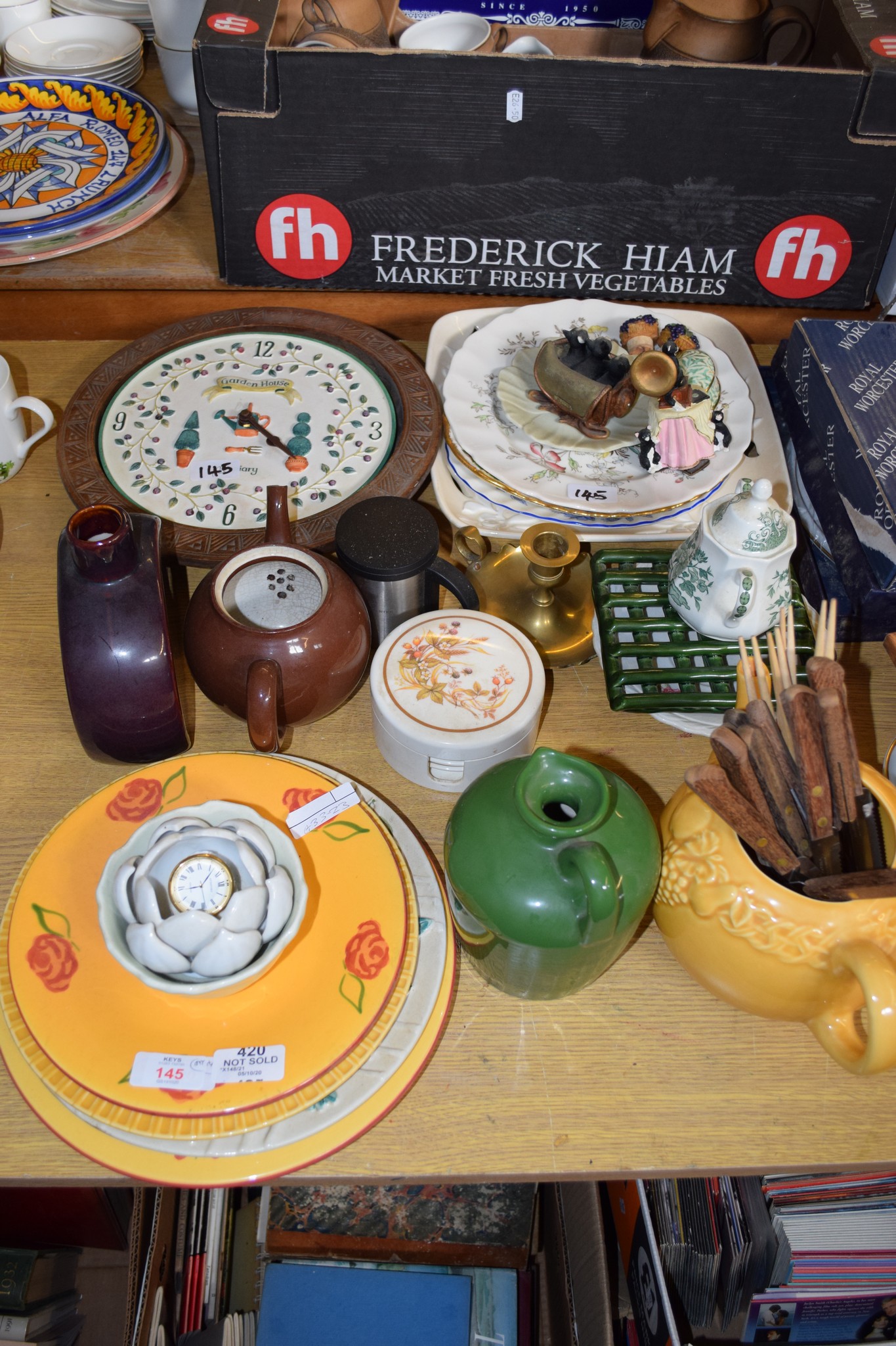 GARDEN HOUSE CLOCK IN FRAME WITH SOME OTHER CHINA