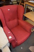 RED UPHOLSTERED WING ARMCHAIR