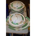 DINNER WARES INCLUDING TWO TUREENS AND COVERS, PLATES, SIDE PLATES, SERVING DISHES