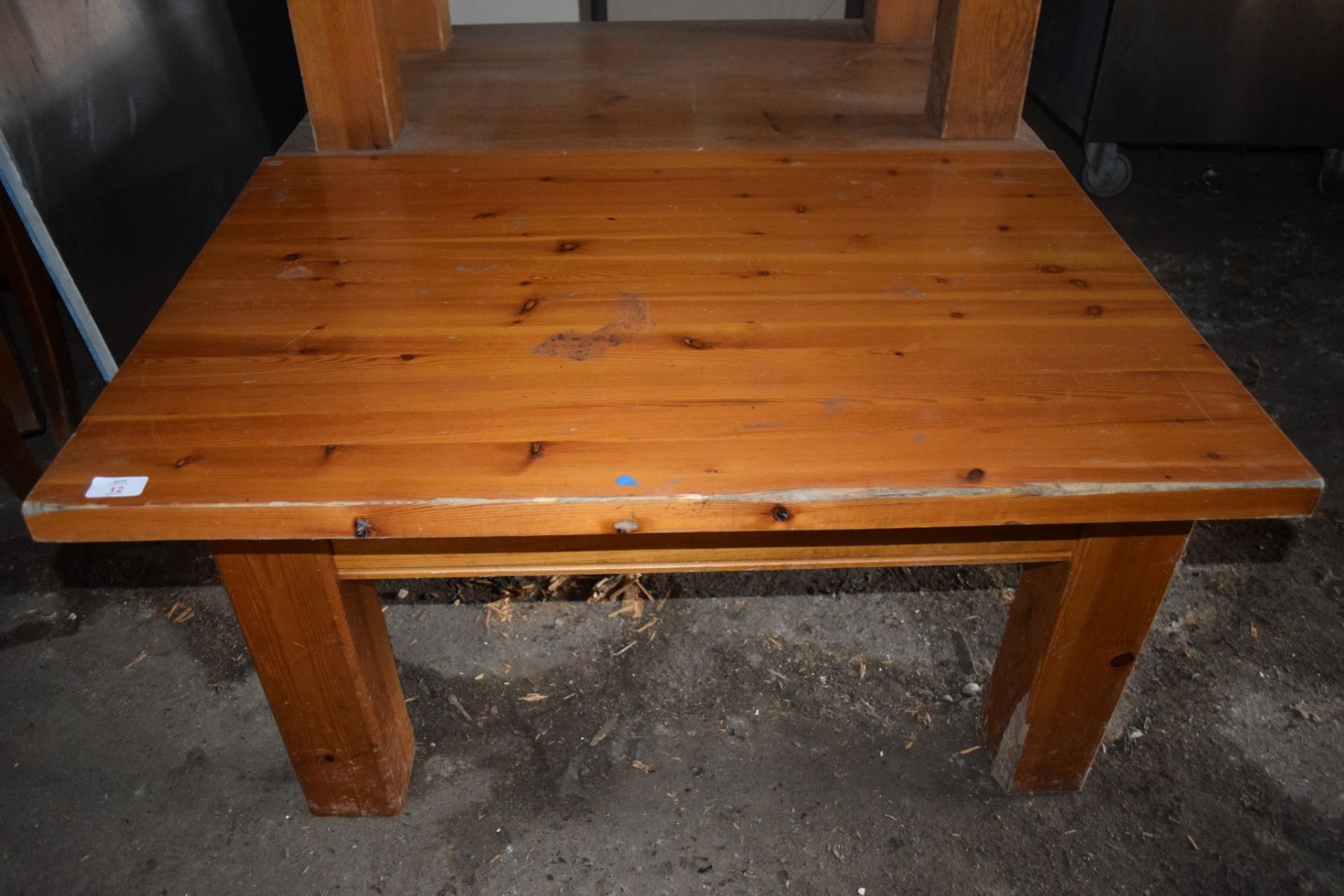 Four rustic stained pine low Bar or Coffee Tables, each on heavy square frame.