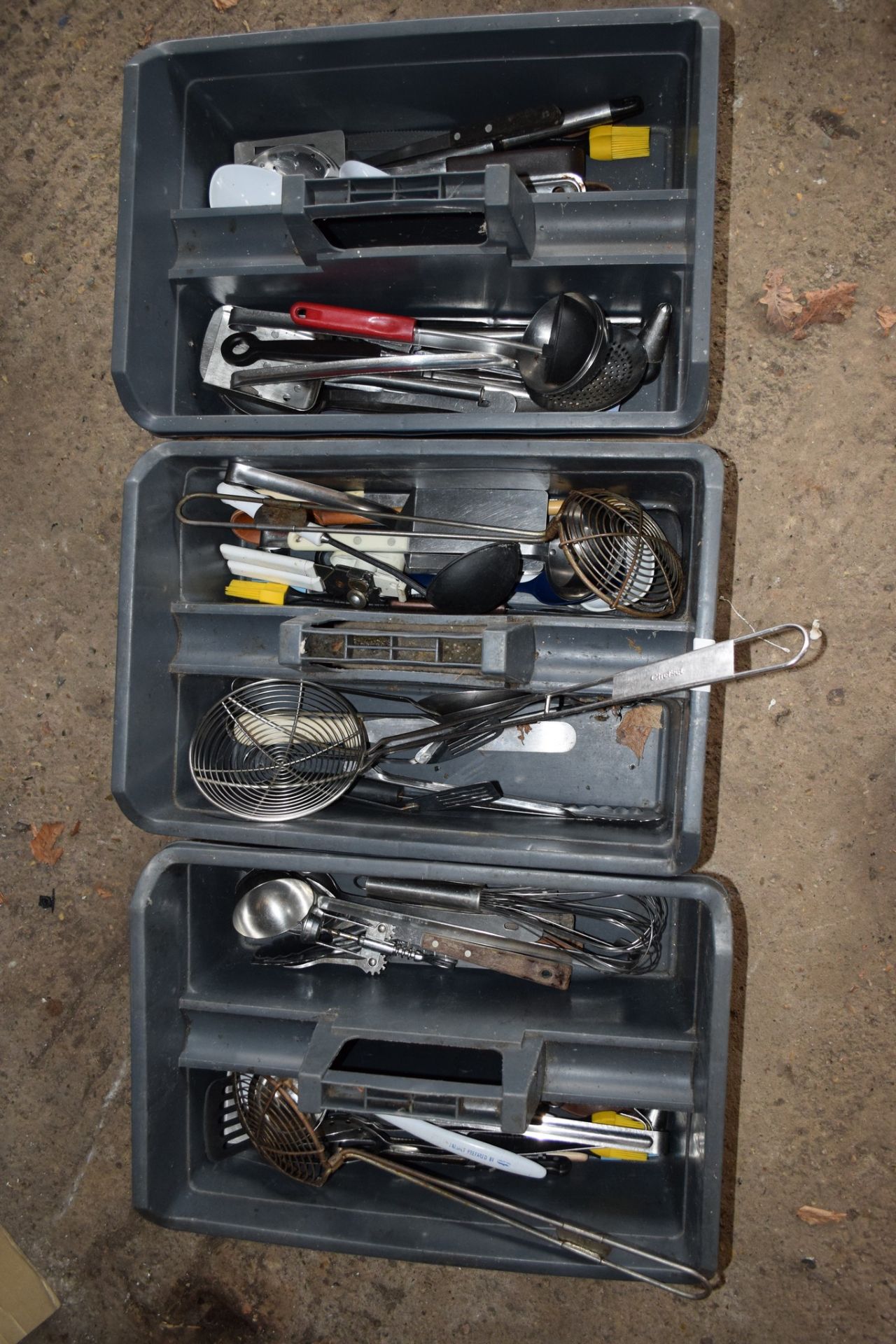 Three Crates containing various Kitchen Implements, including Skimmers, Whisks, Ladles, etc.