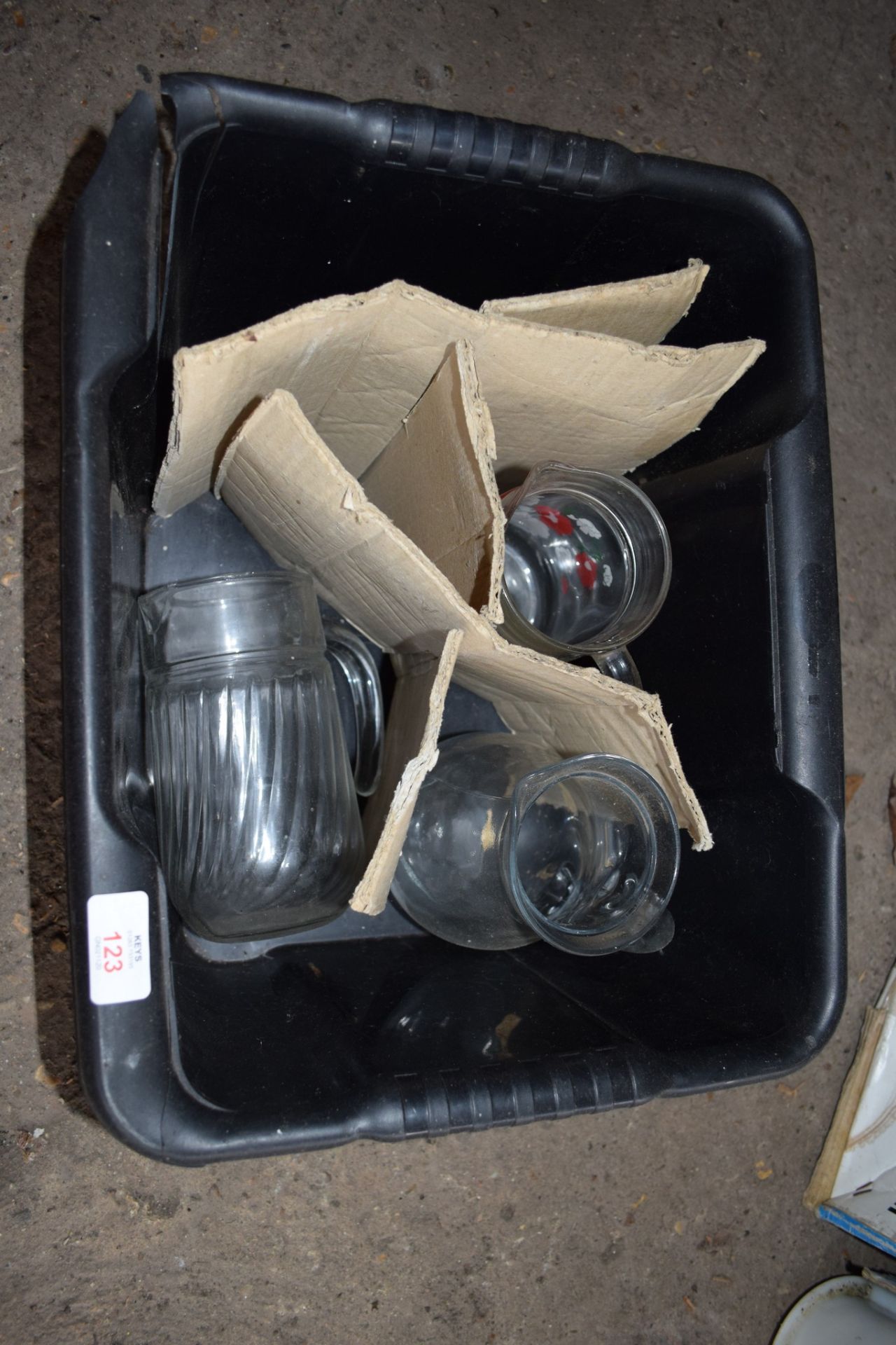 Crate: three various glass Water Jugs.