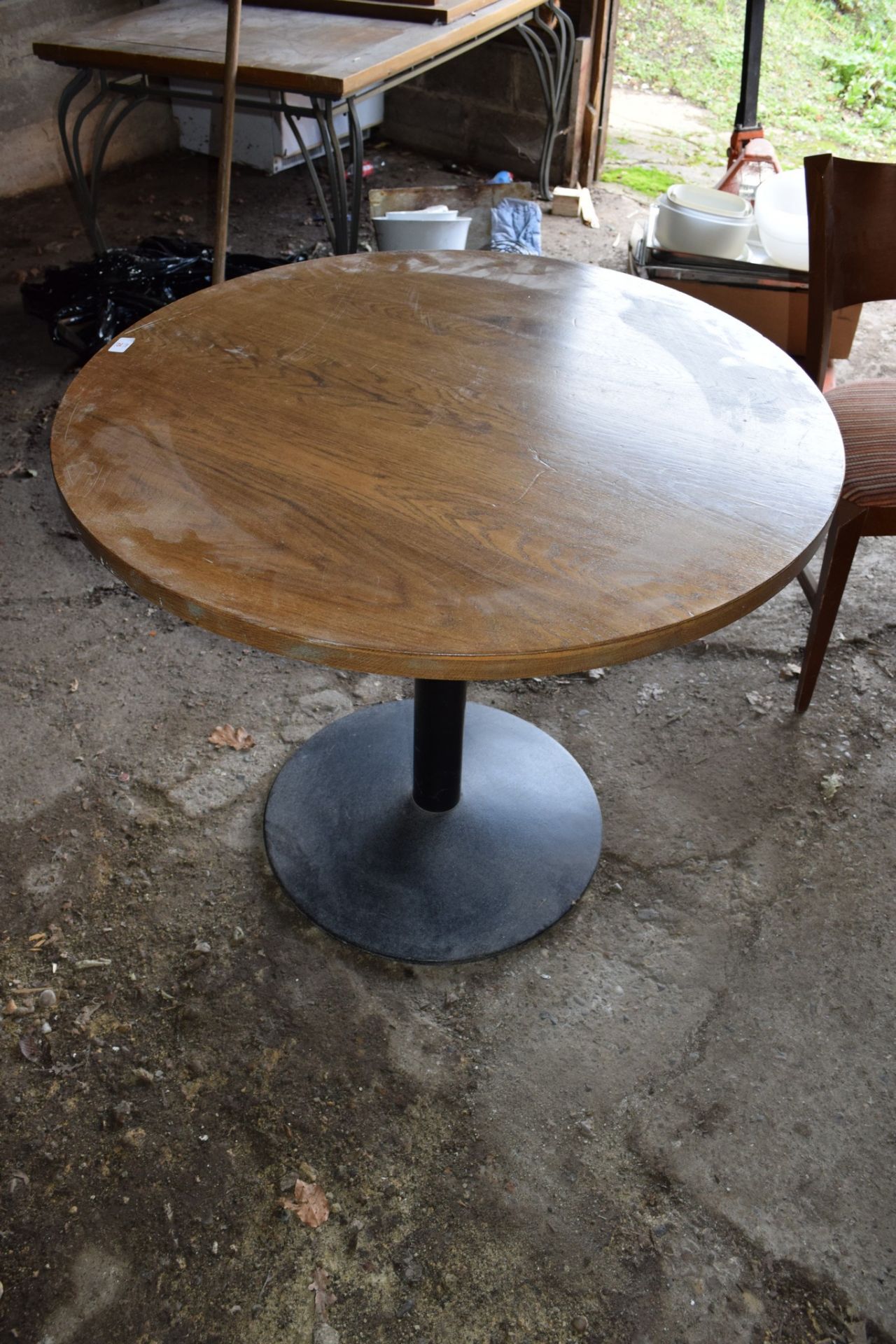 Circular Bar or Dining Table with metal pedestal.